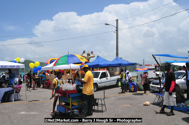 Lucea Cross the Harbour @ Lucea Car Park - All Day Event - Cross the Harbour Swim, Boat Rides, and Entertainment for the Family - Concert Featuring: Bushman, George Nooksl, Little Hero, Bushi One String, Dog Rice and many local Artists - Friday, August 1, 2008 - Lucea, Hanover Jamaica - Photographs by Net2Market.com - Barry J. Hough Sr. Photojournalist/Photograper - Photographs taken with a Nikon D300 - Negril Travel Guide, Negril Jamaica WI - http://www.negriltravelguide.com - info@negriltravelguide.com...!