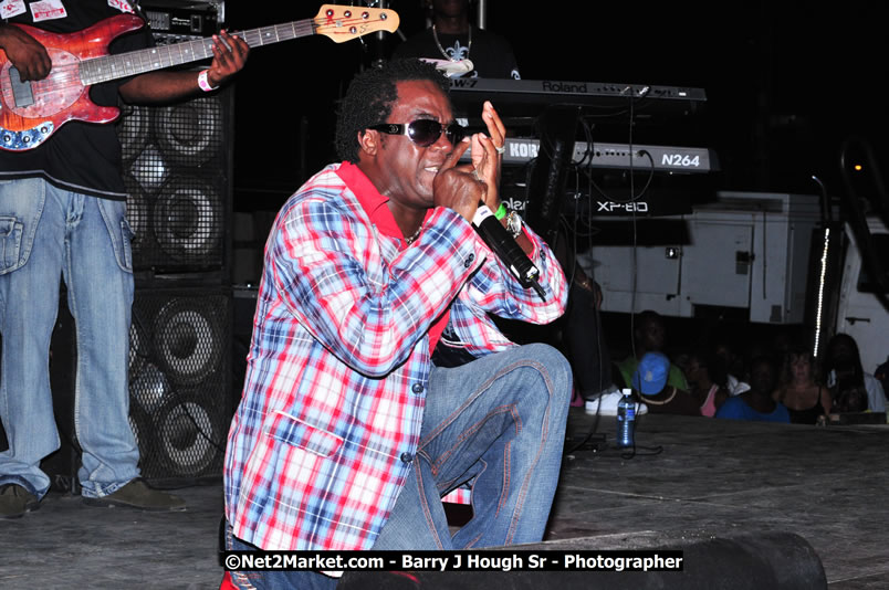 Lucea Cross the Harbour @ Lucea Car Park - All Day Event - Cross the Harbour Swim, Boat Rides, and Entertainment for the Family - Concert Featuring: Bushman, George Nooksl, Little Hero, Bushi One String, Dog Rice and many local Artists - Friday, August 1, 2008 - Lucea, Hanover Jamaica - Photographs by Net2Market.com - Barry J. Hough Sr. Photojournalist/Photograper - Photographs taken with a Nikon D300 - Negril Travel Guide, Negril Jamaica WI - http://www.negriltravelguide.com - info@negriltravelguide.com...!