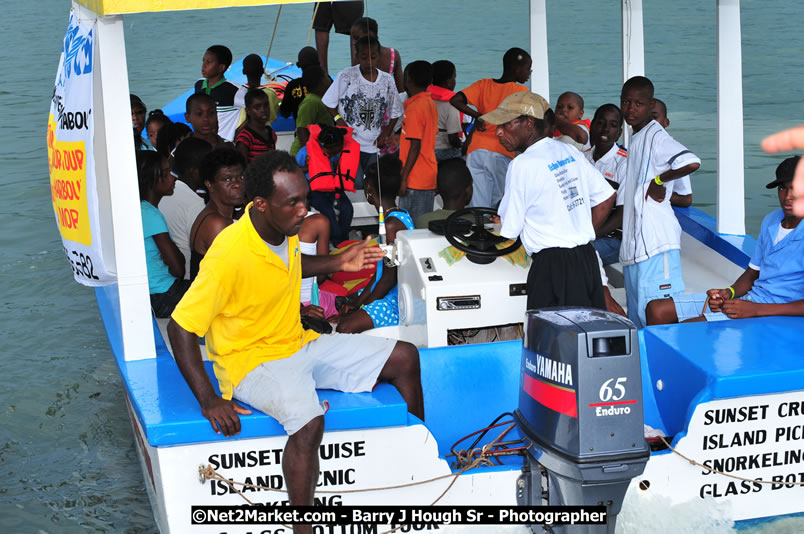 Lucea Cross the Harbour @ Lucea Car Park - All Day Event - Cross the Harbour Swim, Boat Rides, and Entertainment for the Family - Concert Featuring: Bushman, George Nooksl, Little Hero, Bushi One String, Dog Rice and many local Artists - Friday, August 1, 2008 - Lucea, Hanover Jamaica - Photographs by Net2Market.com - Barry J. Hough Sr. Photojournalist/Photograper - Photographs taken with a Nikon D300 - Negril Travel Guide, Negril Jamaica WI - http://www.negriltravelguide.com - info@negriltravelguide.com...!