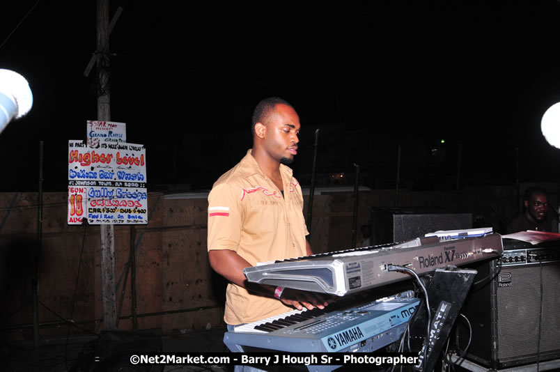 Lucea Cross the Harbour @ Lucea Car Park - All Day Event - Cross the Harbour Swim, Boat Rides, and Entertainment for the Family - Concert Featuring: Bushman, George Nooksl, Little Hero, Bushi One String, Dog Rice and many local Artists - Friday, August 1, 2008 - Lucea, Hanover Jamaica - Photographs by Net2Market.com - Barry J. Hough Sr. Photojournalist/Photograper - Photographs taken with a Nikon D300 - Negril Travel Guide, Negril Jamaica WI - http://www.negriltravelguide.com - info@negriltravelguide.com...!