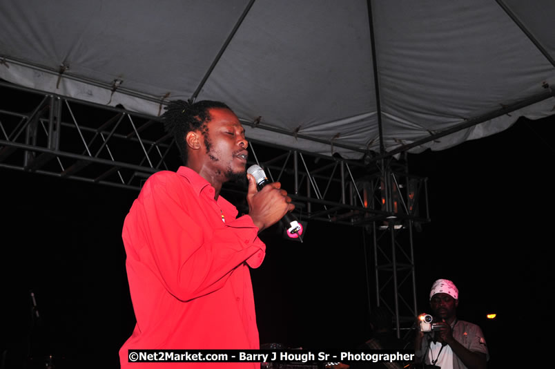 Lucea Cross the Harbour @ Lucea Car Park - All Day Event - Cross the Harbour Swim, Boat Rides, and Entertainment for the Family - Concert Featuring: Bushman, George Nooksl, Little Hero, Bushi One String, Dog Rice and many local Artists - Friday, August 1, 2008 - Lucea, Hanover Jamaica - Photographs by Net2Market.com - Barry J. Hough Sr. Photojournalist/Photograper - Photographs taken with a Nikon D300 - Negril Travel Guide, Negril Jamaica WI - http://www.negriltravelguide.com - info@negriltravelguide.com...!