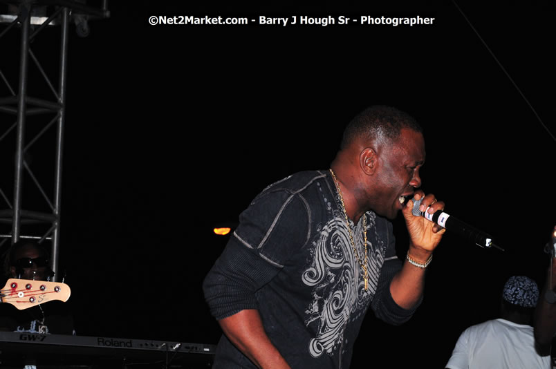 Lucea Cross the Harbour @ Lucea Car Park - All Day Event - Cross the Harbour Swim, Boat Rides, and Entertainment for the Family - Concert Featuring: Bushman, George Nooksl, Little Hero, Bushi One String, Dog Rice and many local Artists - Friday, August 1, 2008 - Lucea, Hanover Jamaica - Photographs by Net2Market.com - Barry J. Hough Sr. Photojournalist/Photograper - Photographs taken with a Nikon D300 - Negril Travel Guide, Negril Jamaica WI - http://www.negriltravelguide.com - info@negriltravelguide.com...!