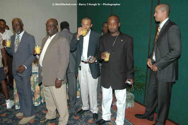 Red Cap Porters Awards - Minister of Tourism, Hon. Edmund Bartlett - Director of Tourism, Basil Smith - Friday, December 14, 2007 - Holiday Inn Sunspree, Montego Bay, Jamaica W.I. - Photographs by Net2Market.com - Barry J. Hough Sr, Photographer - Negril Travel Guide, Negril Jamaica WI - http://www.negriltravelguide.com - info@negriltravelguide.com...!