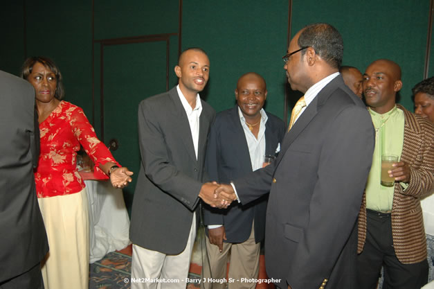 Red Cap Porters Awards - Minister of Tourism, Hon. Edmund Bartlett - Director of Tourism, Basil Smith - Friday, December 14, 2007 - Holiday Inn Sunspree, Montego Bay, Jamaica W.I. - Photographs by Net2Market.com - Barry J. Hough Sr, Photographer - Negril Travel Guide, Negril Jamaica WI - http://www.negriltravelguide.com - info@negriltravelguide.com...!