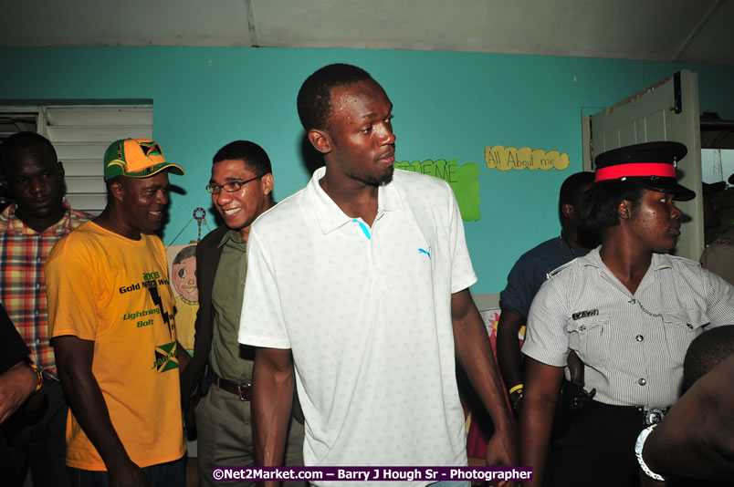 Usain Bolt of Jamaica - The Fastest Man In The World  - Usain Bolt Homecoming Celebrations - Press Conference at the Grand Bahia Principe &amp; Sherwood Content - Waldensia Primary School - Photographs by Net2Market.com - Barry J. Hough Sr. Photojournalist/Photograper - Photographs taken with a Nikon D300 - Negril Travel Guide, Negril Jamaica WI - http://www.negriltravelguide.com - info@negriltravelguide.com...!